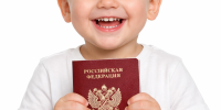 Toddler proudly holds Russian passport